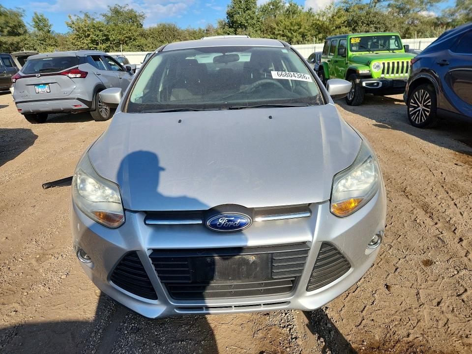 Photo 5 from auction – 2012 FORD FOCUS with VIN 1FAHP3F26CL176021