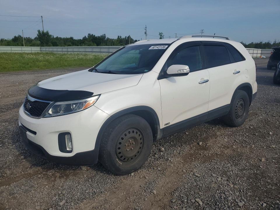 KIA SORENTO 2015 with VIN 5XYKTCA69FG619574 - Photo from auction