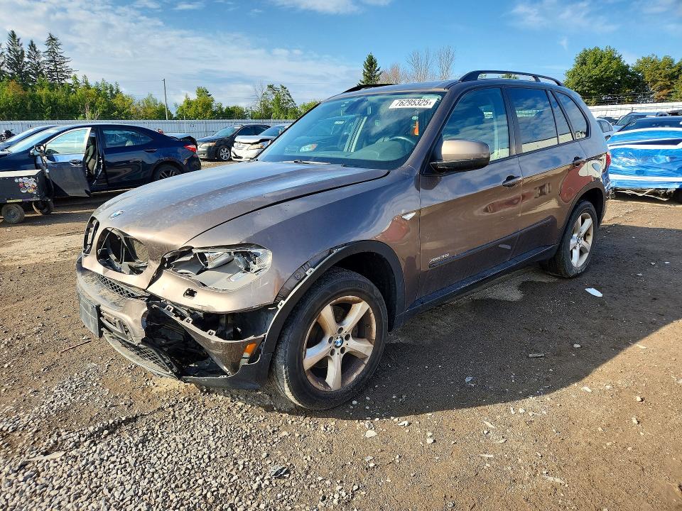 BMW X5 2012 with VIN 5UXZV4C56CL764699 - Photo from auction