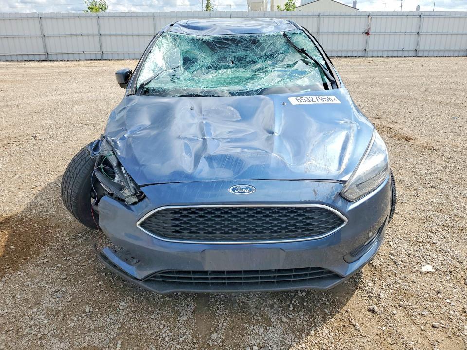 Photo 5 from auction – 2018 FORD FOCUS with VIN 1FADP3M26JL258104