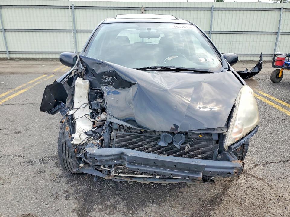 Photo 5 from auction – 2009 HONDA FIT with VIN JHMGE88429S027724