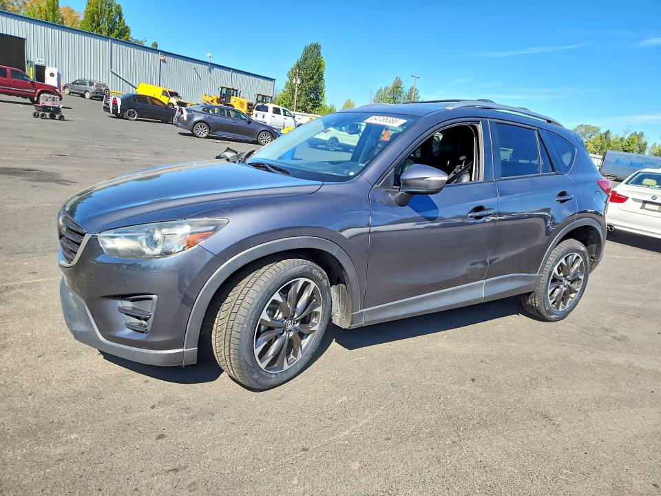 MAZDA CX-5 2016 with VIN JM3KE4DY8G0752127 - Photo from auction
