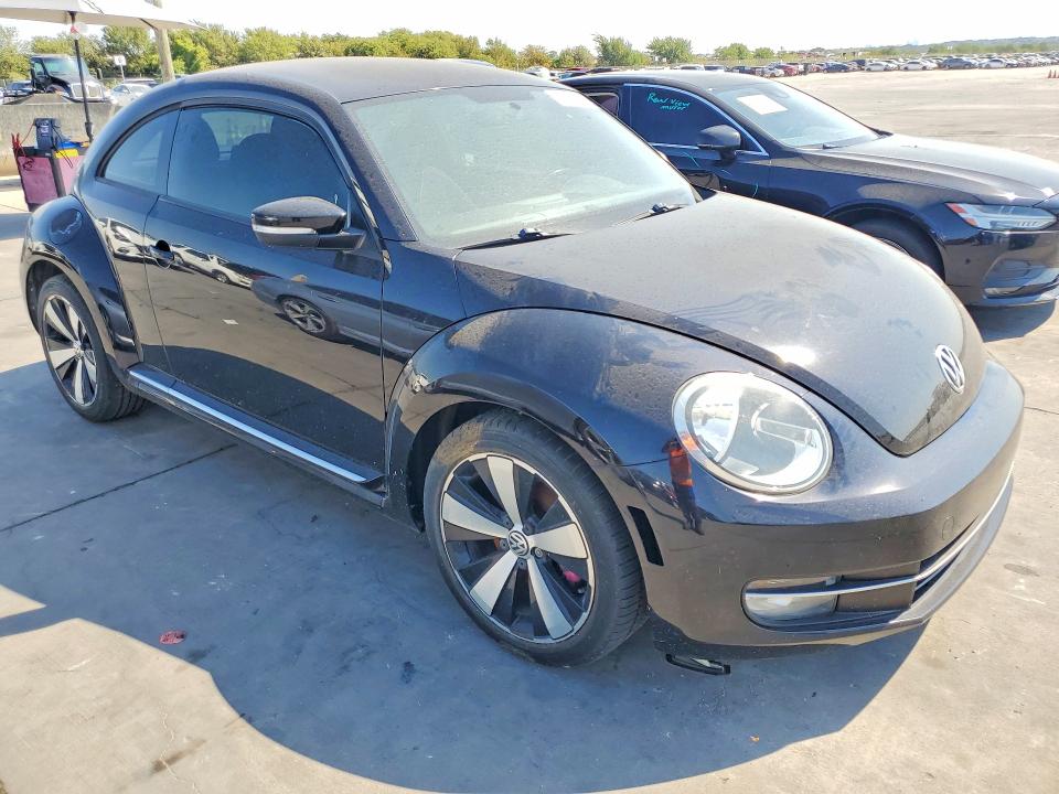 Photo 4 from auction – 2012 VOLKSWAGEN BEETLE with VIN 3VWV67AT9CM617286