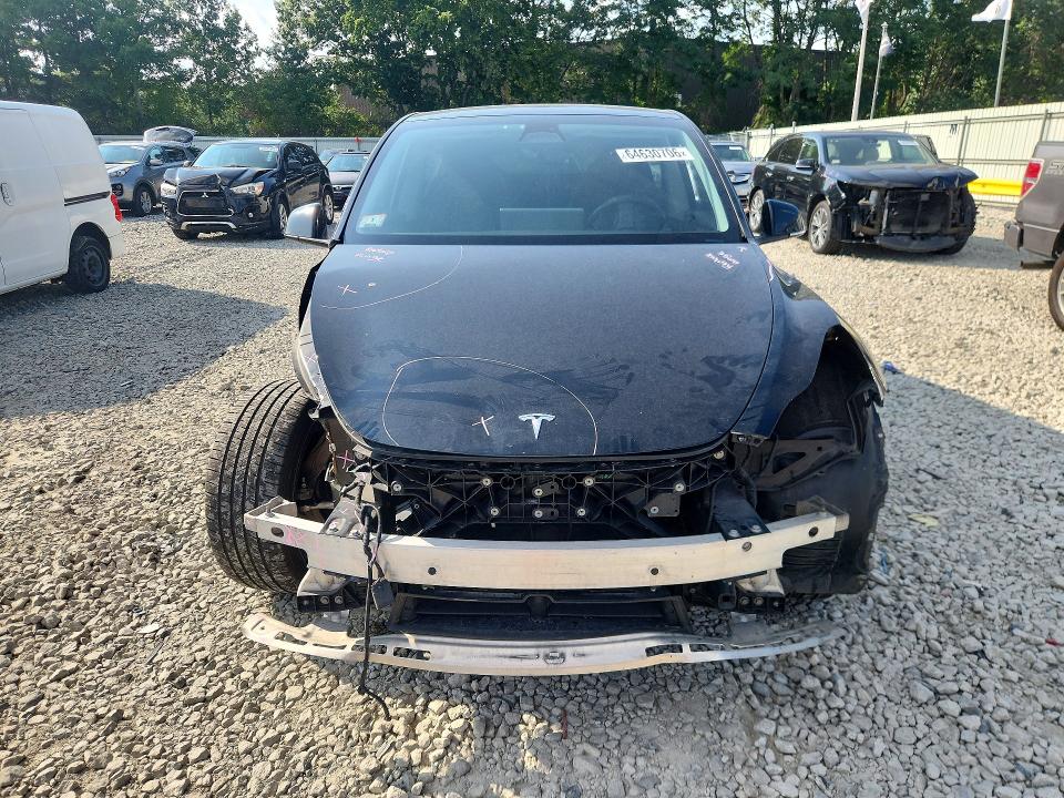 Photo 5 from auction – 2023 TESLA MODEL Y with VIN 7SAYGDEE4PA052527