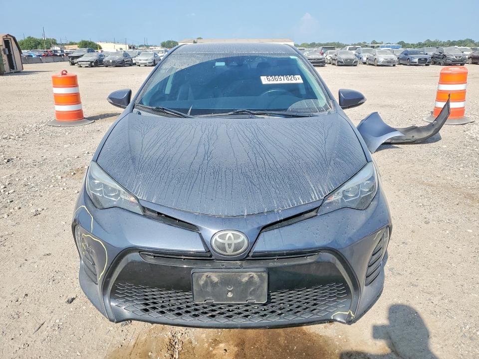 Photo 5 from auction – 2017 TOYOTA COROLLA with VIN 5YFBURHE8HP710122