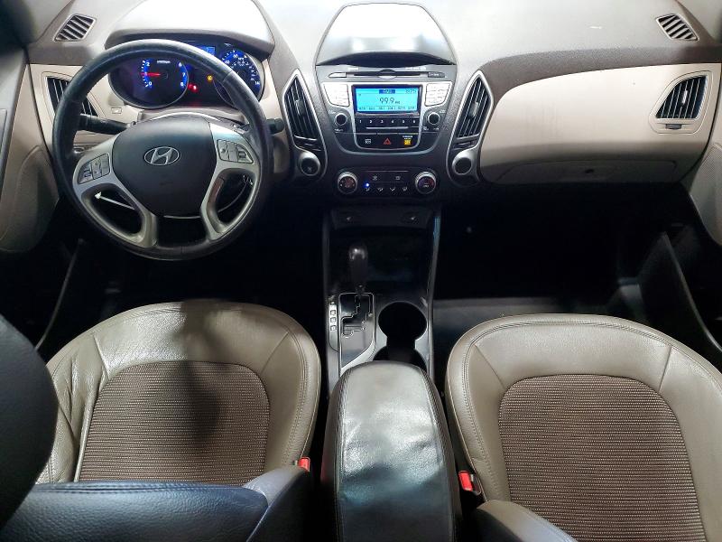 Photo 8 from auction – 2012 HYUNDAI TUCSON with VIN KM8JUCAC5CU385454