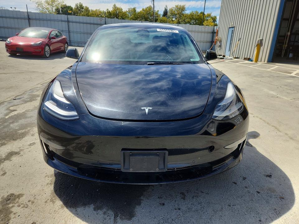 Photo 5 from auction – 2022 TESLA MODEL 3 with VIN 5YJ3E1EA9NF289684