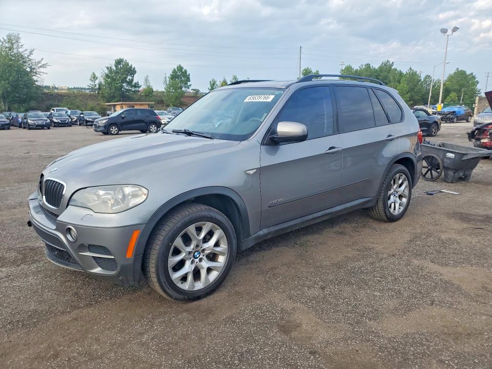 BMW X5 2013 with VIN 5UXZV4C59D0B05408 - Photo from auction