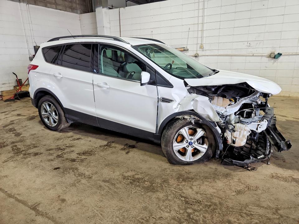 Photo 4 from auction – 2014 FORD ESCAPE with VIN 1FMCU9G90EUD59967