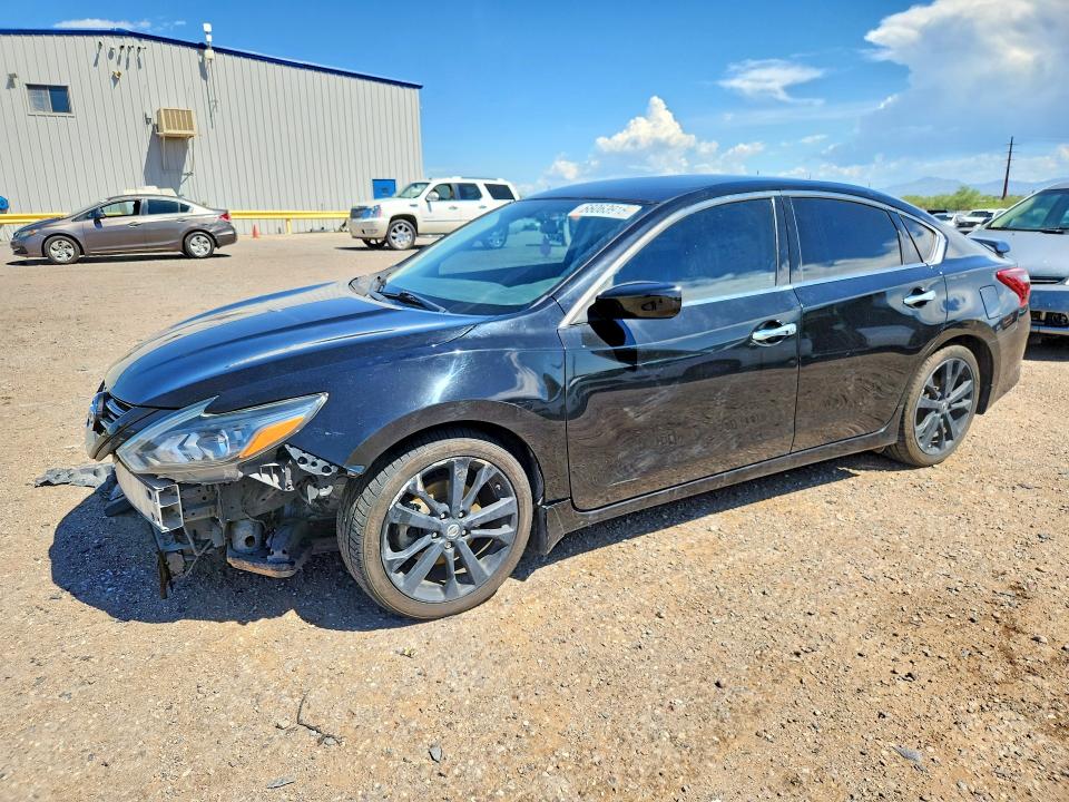 NISSAN ALTIMA 2018 with VIN 1N4AL3AP9JC186121 - Photo from auction