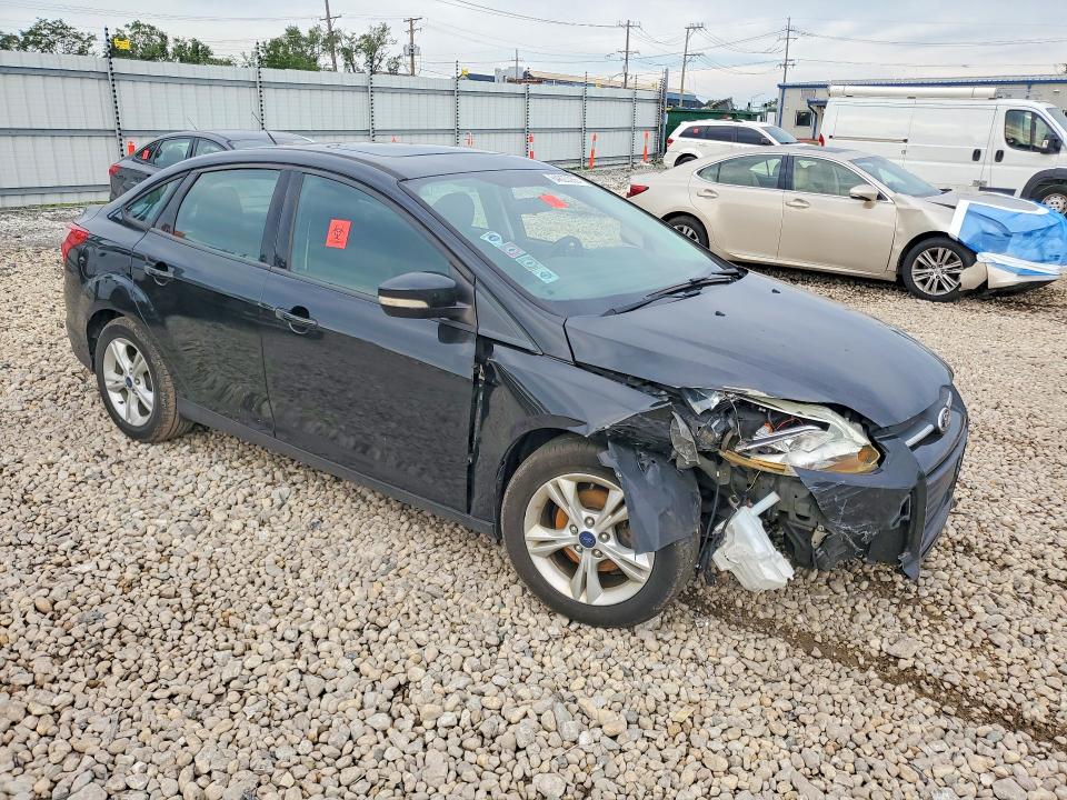 Photo 4 from auction – 2014 FORD FOCUS with VIN 1FADP3F23EL410911
