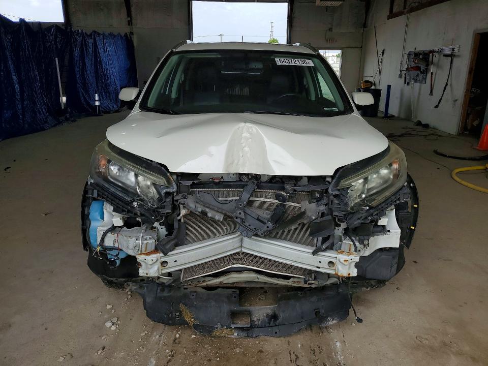 Photo 5 from auction – 2016 HONDA CR-V with VIN 5J6RM4H78GL053908
