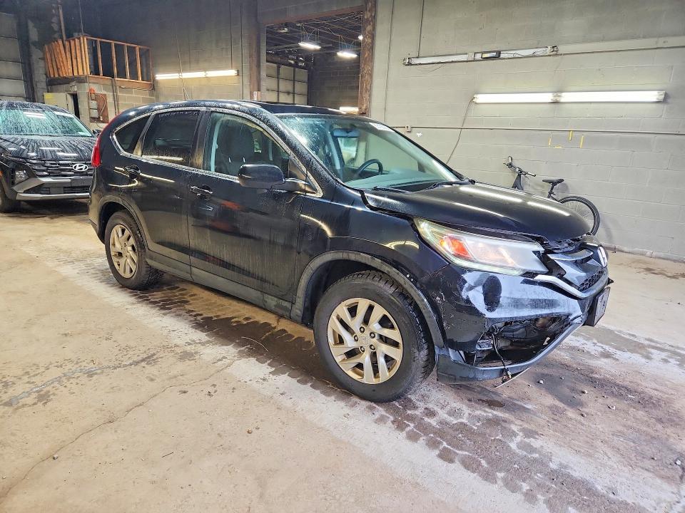 Photo 4 from auction – 2016 HONDA CR-V with VIN 5J6RM4H54GL091327