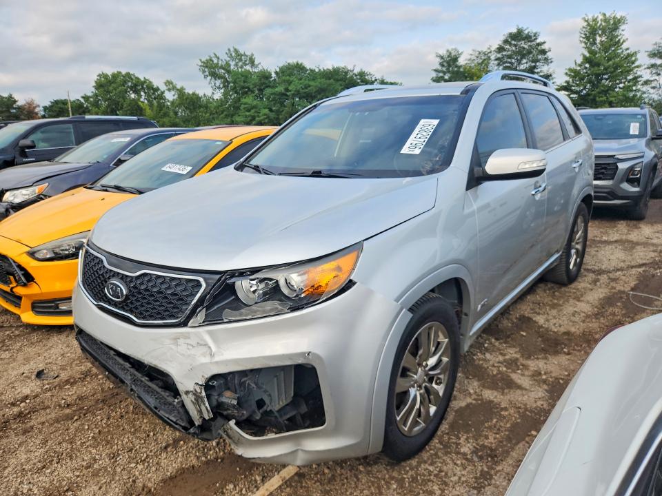 KIA SORENTO 2011 with VIN 5XYKWDA22BG144998 - Photo from auction