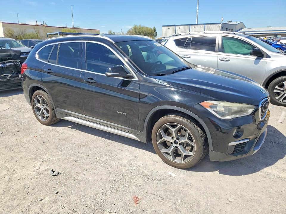 Photo 4 from auction – 2016 BMW X1 with VIN WBXHT3C34GP888564