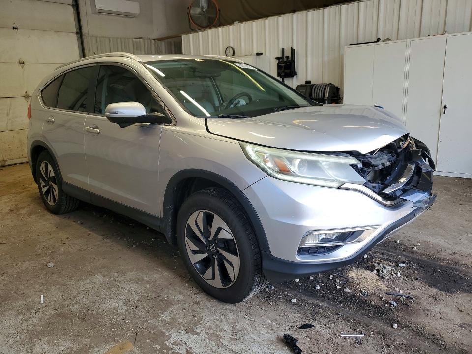 Photo 4 from auction – 2015 HONDA CR-V with VIN 5J6RM4H95FL132811