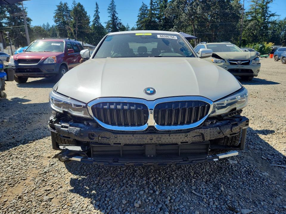 Photo 5 from auction – 2021 BMW 330I with VIN 3MW5R1J04M8B70273