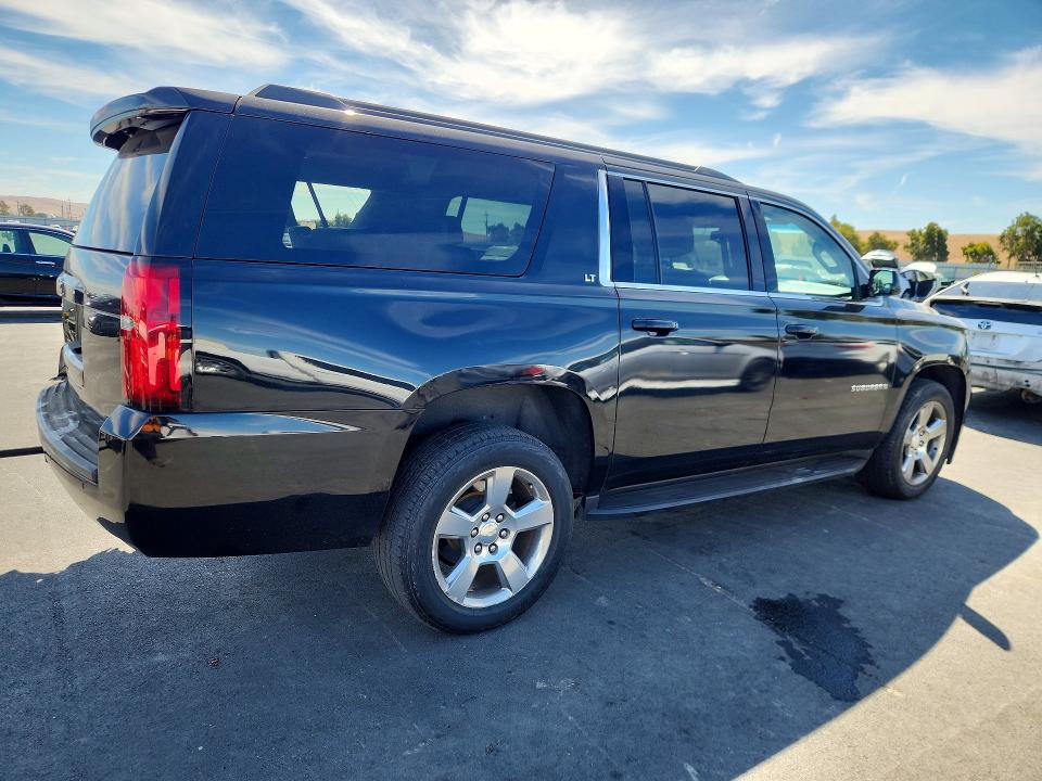 Photo 3 from auction – 2020 CHEVROLET SUBURBAN with VIN 1GNSCHKCXLR160867