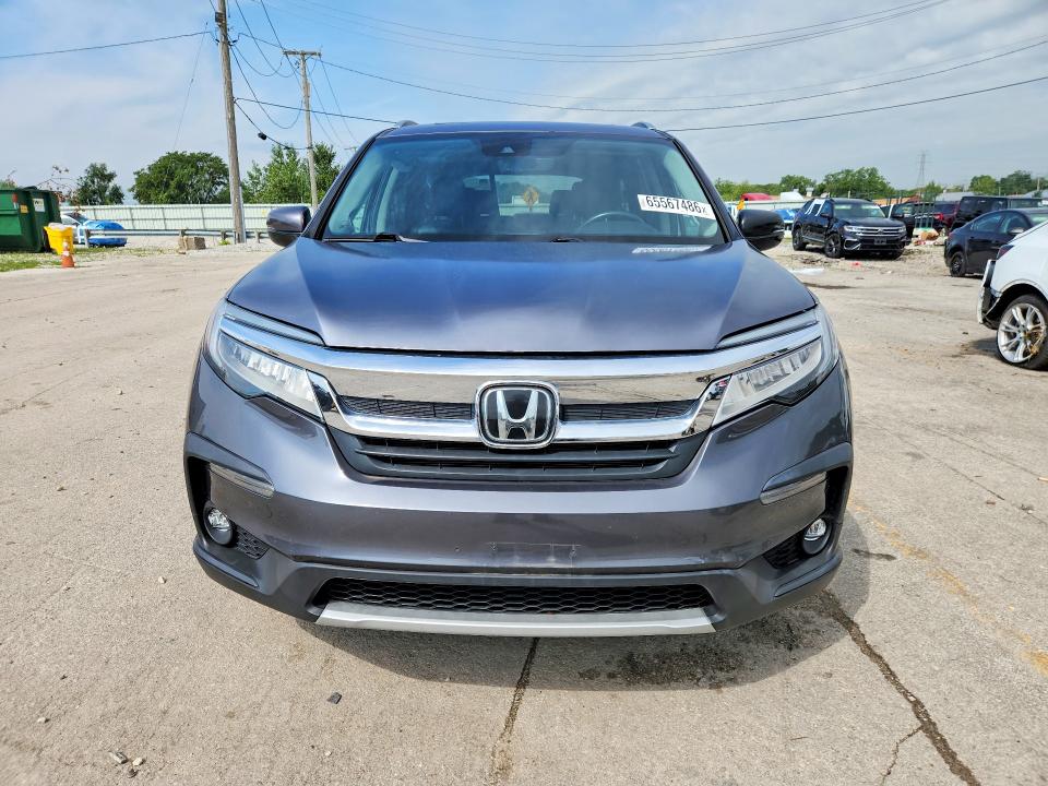 Photo 5 from auction – 2022 HONDA PILOT with VIN 5FNYF6H64NB034545