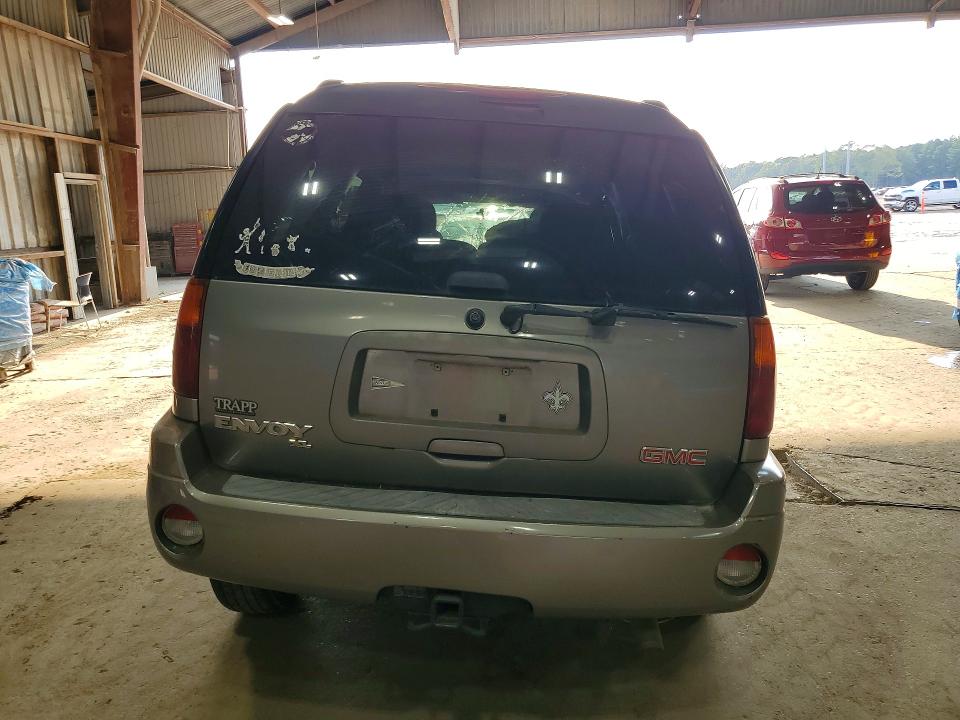 Photo 6 from auction – 2005 GMC ENVOY with VIN 1GKES16S556140228