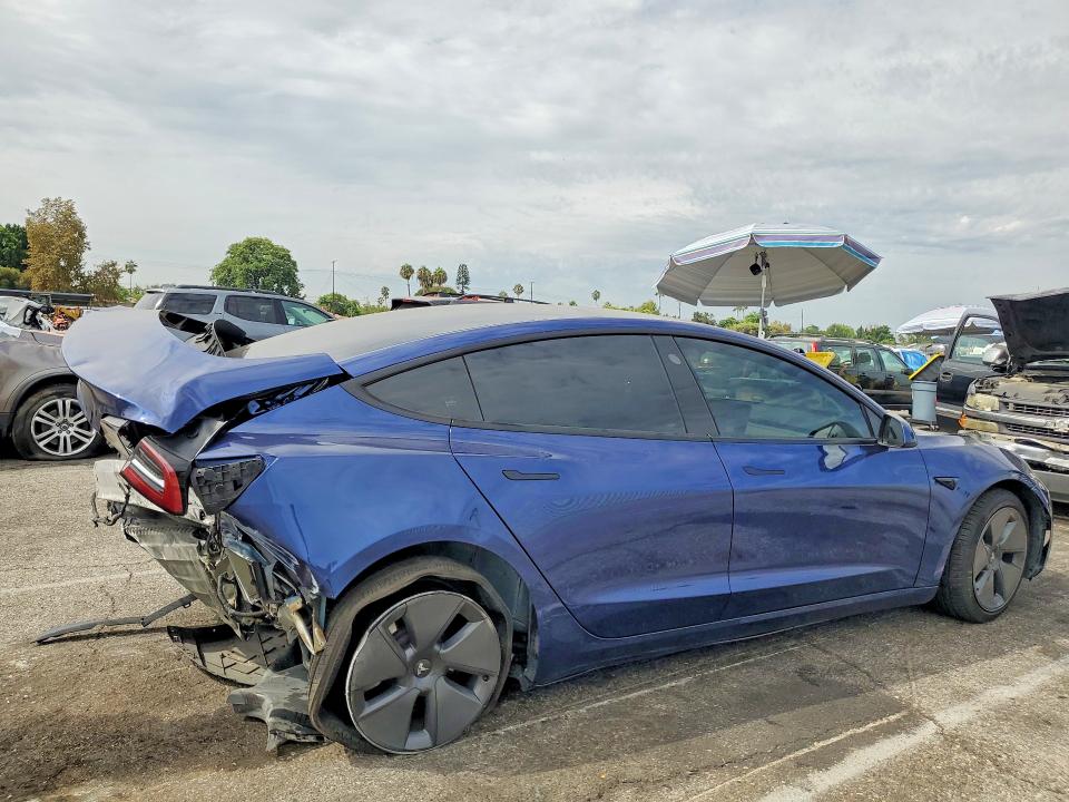 Photo 3 from auction – 2022 TESLA MODEL 3 with VIN 5YJ3E1EAXNF372721