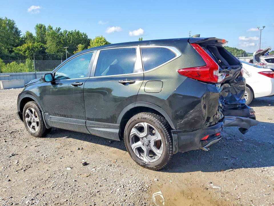 Photo 2 from auction – 2018 HONDA CR-V with VIN 7FARW2H51JE095502