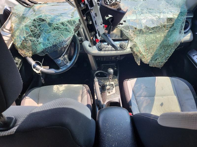 Photo 8 from auction – 2018 TOYOTA RAV4 with VIN 2T3RFREV0JW808716