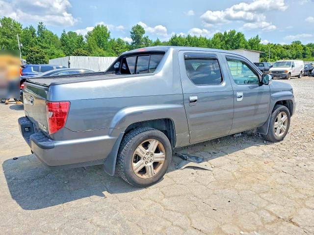 Photo 3 from auction – 2011 HONDA RIDGELINE with VIN 5FPYK1F51BB009324