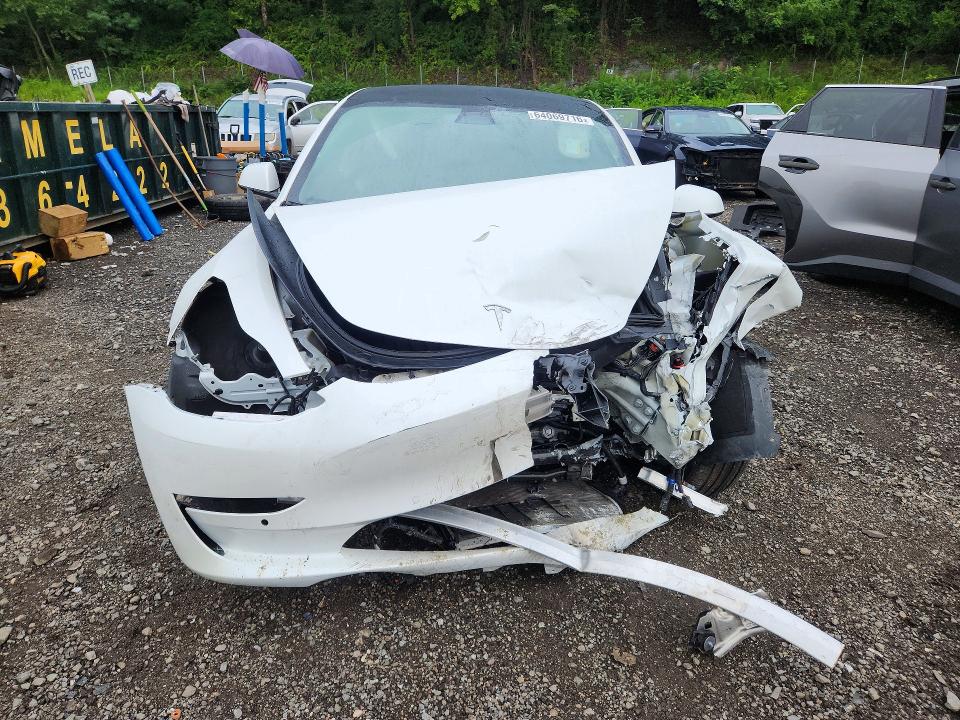 Photo 5 from auction – 2022 TESLA MODEL 3 with VIN 5YJ3E1EB7NF238113