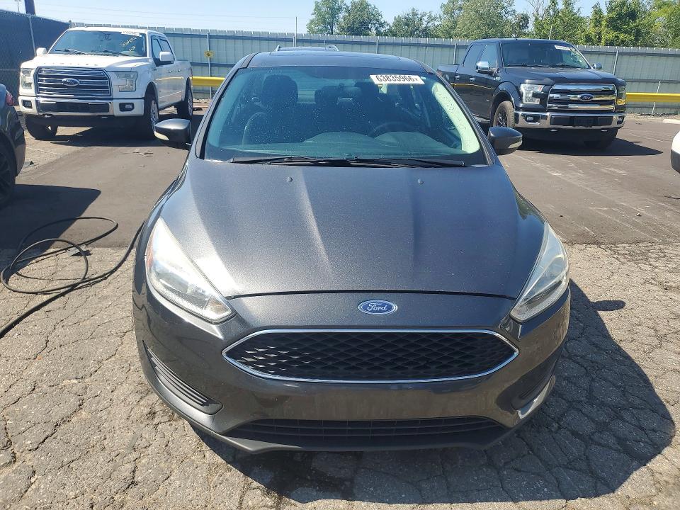 Photo 5 from auction – 2016 FORD FOCUS with VIN 1FADP3F20GL227016