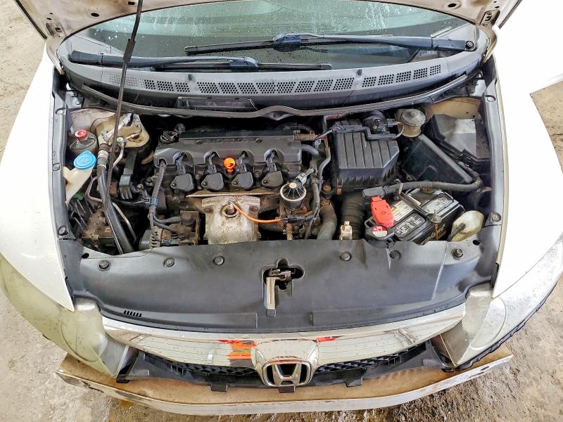 Photo 11 from auction – 2010 HONDA CIVIC with VIN 19XFA1F60AE047692