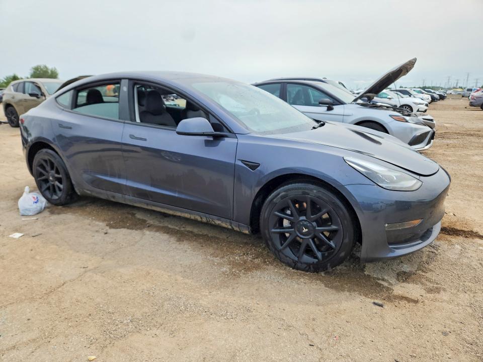 Photo 4 from auction – 2023 TESLA MODEL 3 with VIN 5YJ3E1EB4PF668927