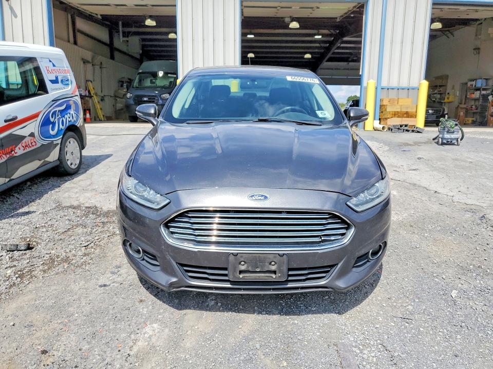 Photo 5 from auction – 2016 FORD FUSION with VIN 3FA6P0LU5GR178703