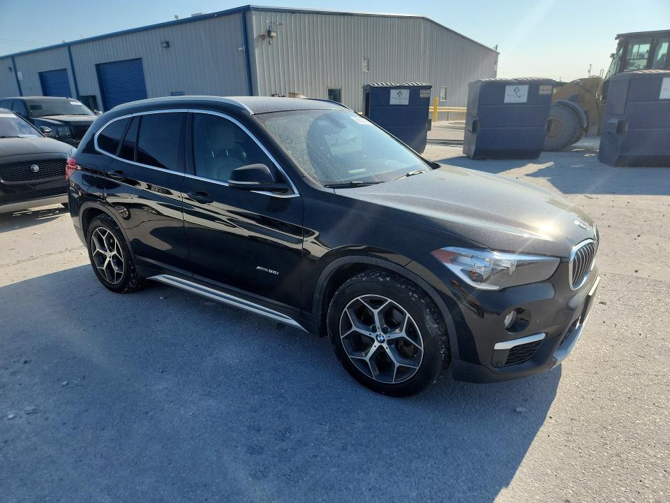 Photo 4 from auction – 2018 BMW X1 with VIN WBXHT3C38J5F91772