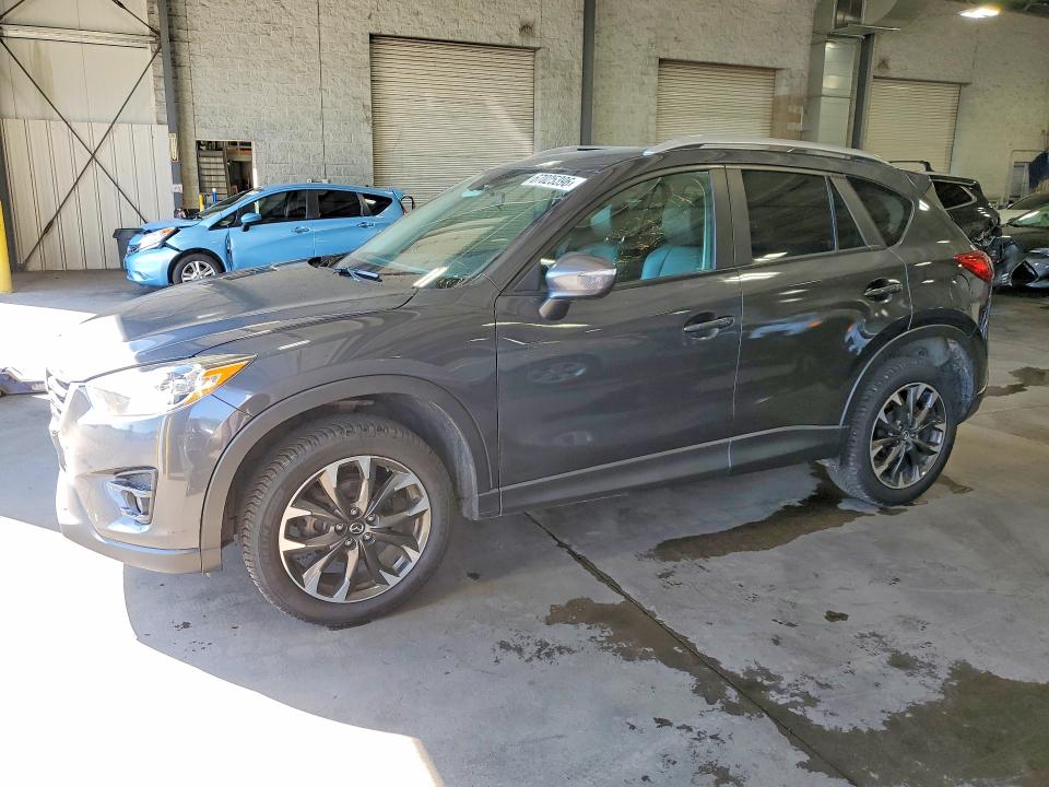 MAZDA CX-5 2016 with VIN JM3KE4DY3G0791756 - Photo from auction