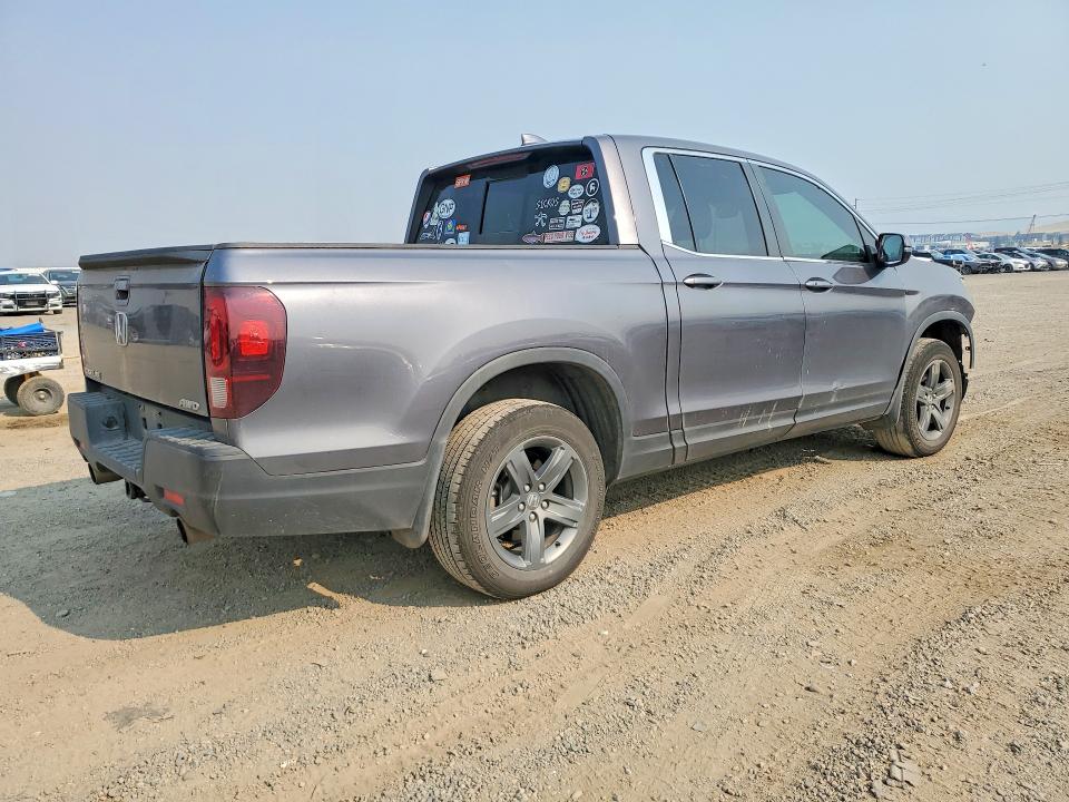 Photo 3 from auction – 2023 HONDA RIDGELINE with VIN 5FPYK3F57PB007225