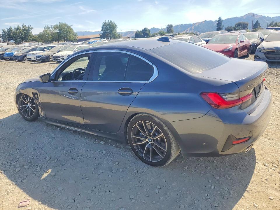 Photo 2 from auction – 2021 BMW 330XE with VIN 3MW5P9J02M8B89392