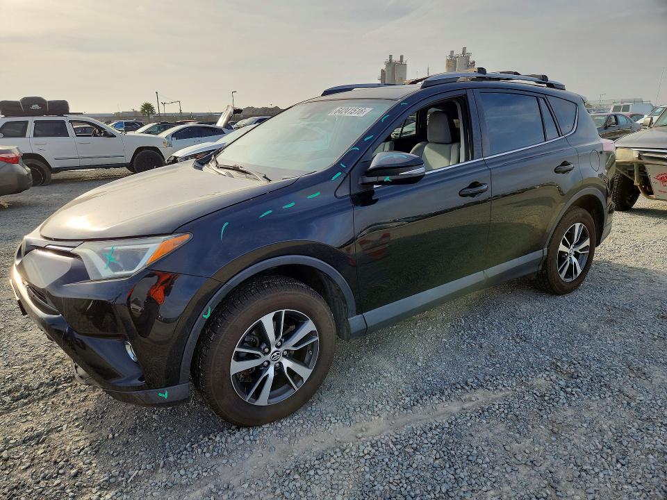 TOYOTA RAV4 2017 with VIN 2T3RFREV9HW605642 - Photo from auction