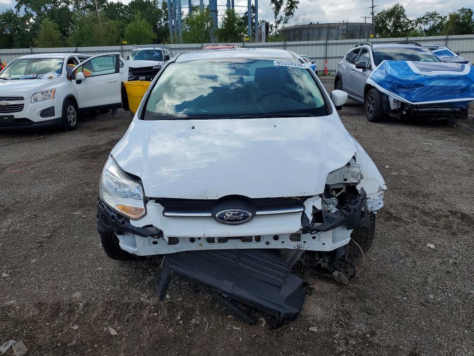 Снимка 5 от търг – 2014 FORD FOCUS с VIN 1FADP3F24EL286342