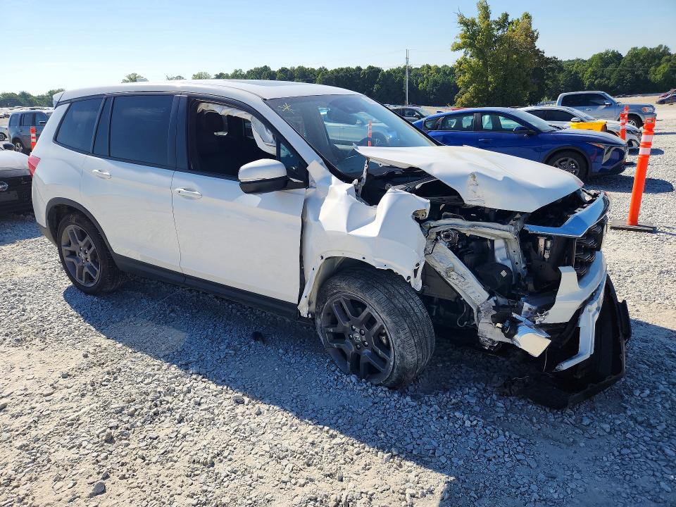 Photo 4 from auction – 2023 HONDA PASSPORT with VIN 5FNYF8H56PB001844