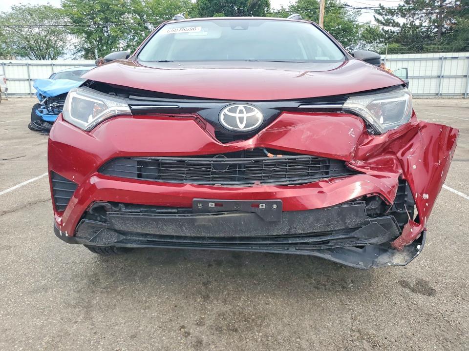 Photo 5 from auction – 2018 TOYOTA RAV4 with VIN 2T3BFREV0JW827185