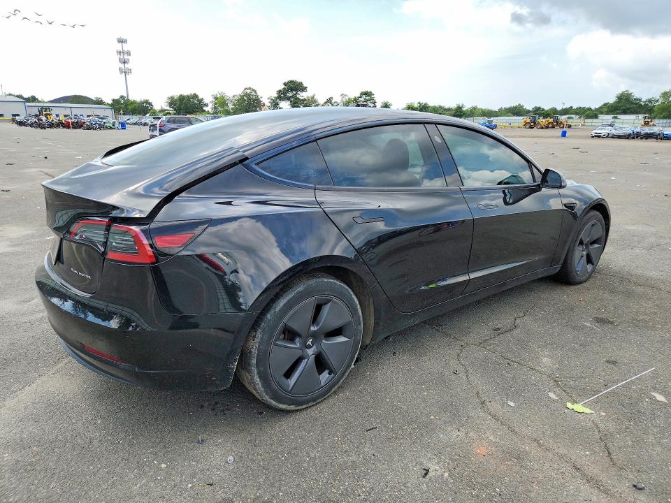 Photo 3 from auction – 2023 TESLA MODEL 3 with VIN 5YJ3E1EB9PF710413