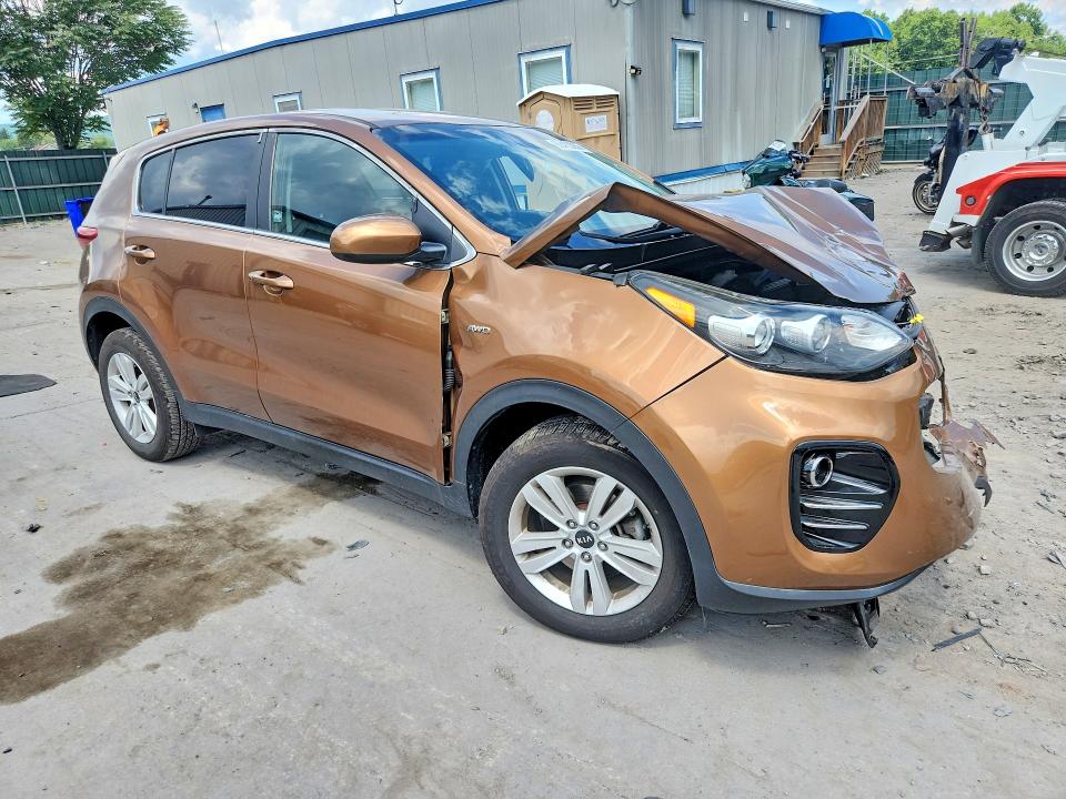 Photo 4 from auction – 2000 KIA SPORTAGE with VIN KNDPMCAC4K7575225