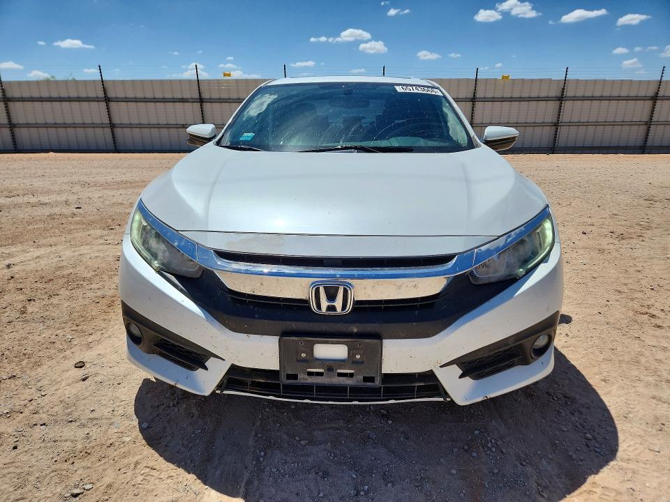 Photo 5 from auction – 2016 HONDA CIVIC with VIN 19XFC1F77GE039732
