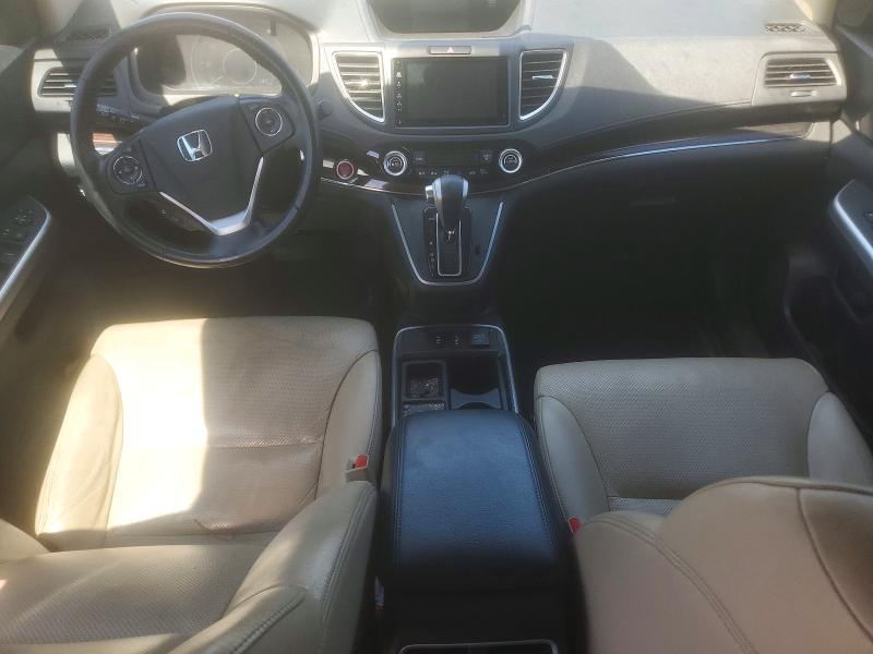 Photo 8 from auction – 2015 HONDA CR-V with VIN 2HKRM4H72FH665305