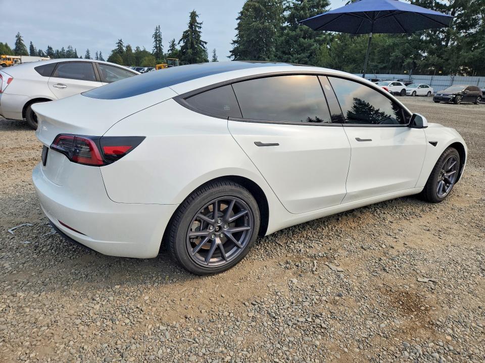 Photo 3 from auction – 2023 TESLA MODEL 3 with VIN 5YJ3E1EA4PF641539
