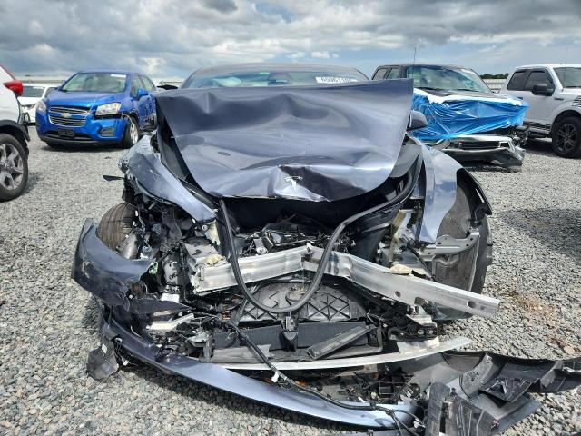 Photo 5 from auction – 2022 TESLA MODEL 3 with VIN 5YJ3E1EBXNF104874