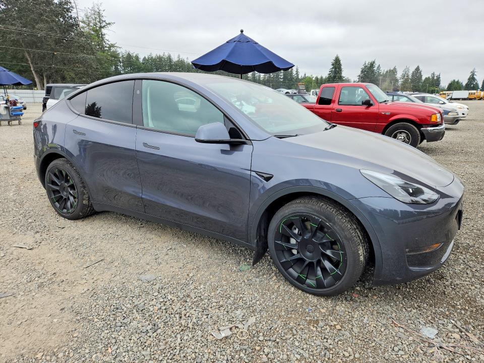 Фото 4 с аукциона – 2023 TESLA MODEL Y с VIN 7SAYGDEE9PF921030