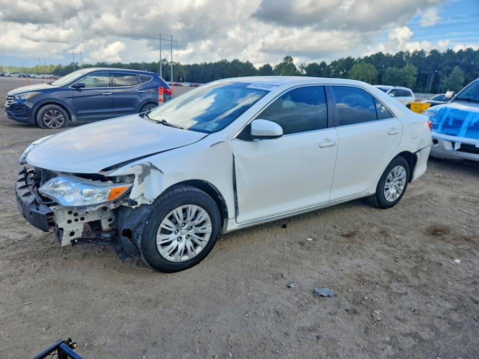 TOYOTA CAMRY 2014 with VIN 4T4BF1FKXER357502 - Photo from auction