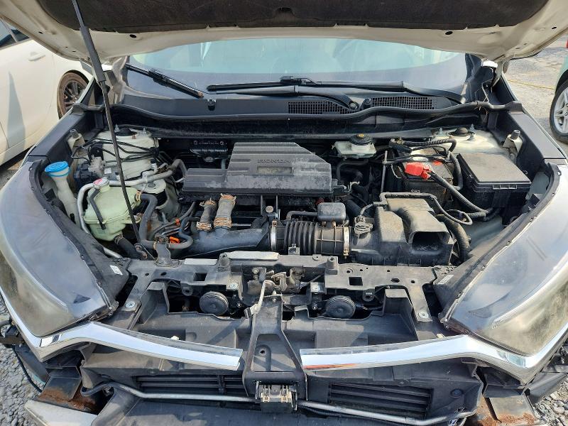 Photo 12 from auction – 2017 HONDA CR-V with VIN 2HKRW2H83HH611084